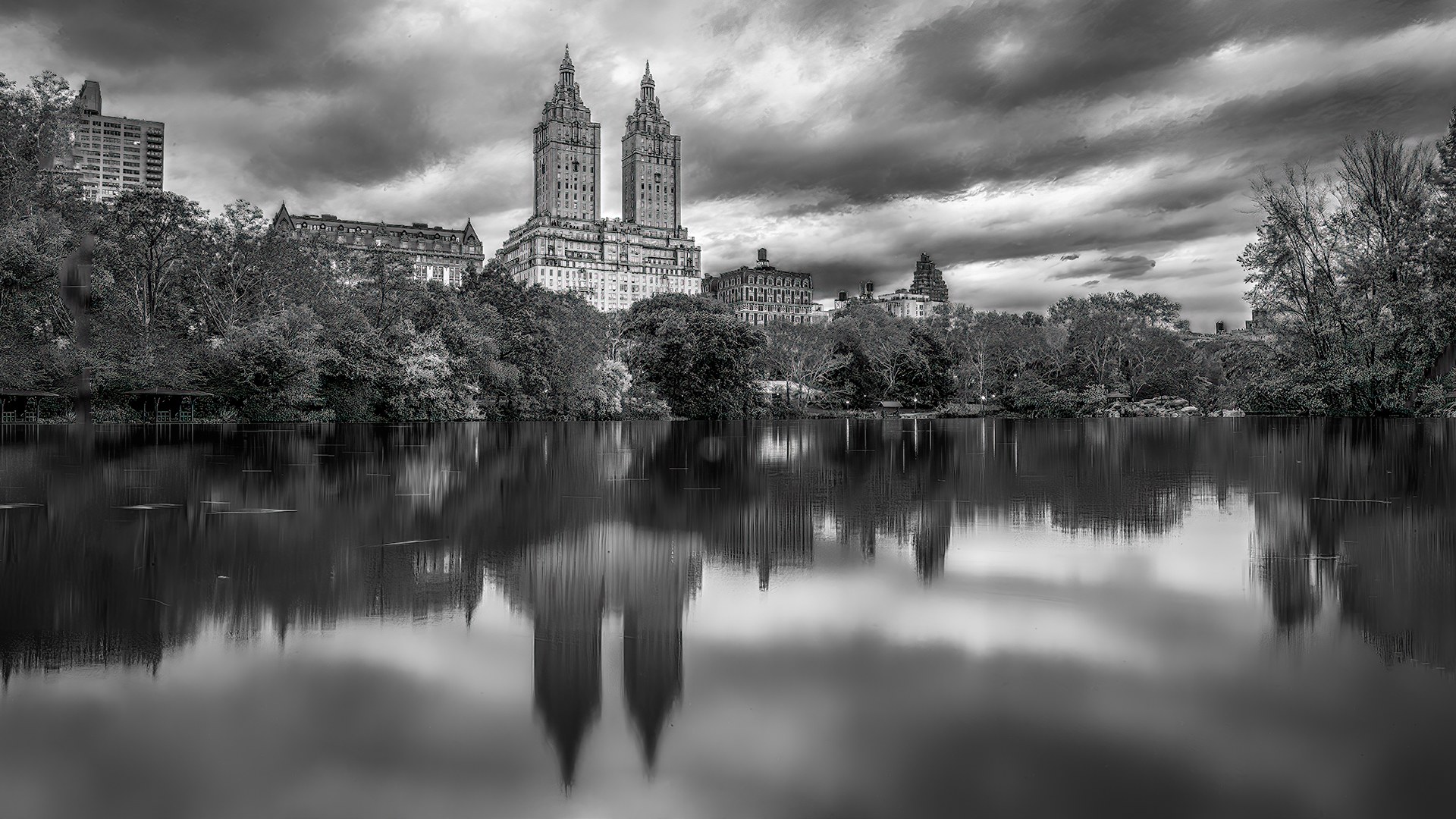 San Remo reflected thru Central Park Lake, New York — fine art photography print by Achyudhan Mani